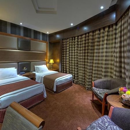 Delmon Palace Hotel Dubai Ruang foto